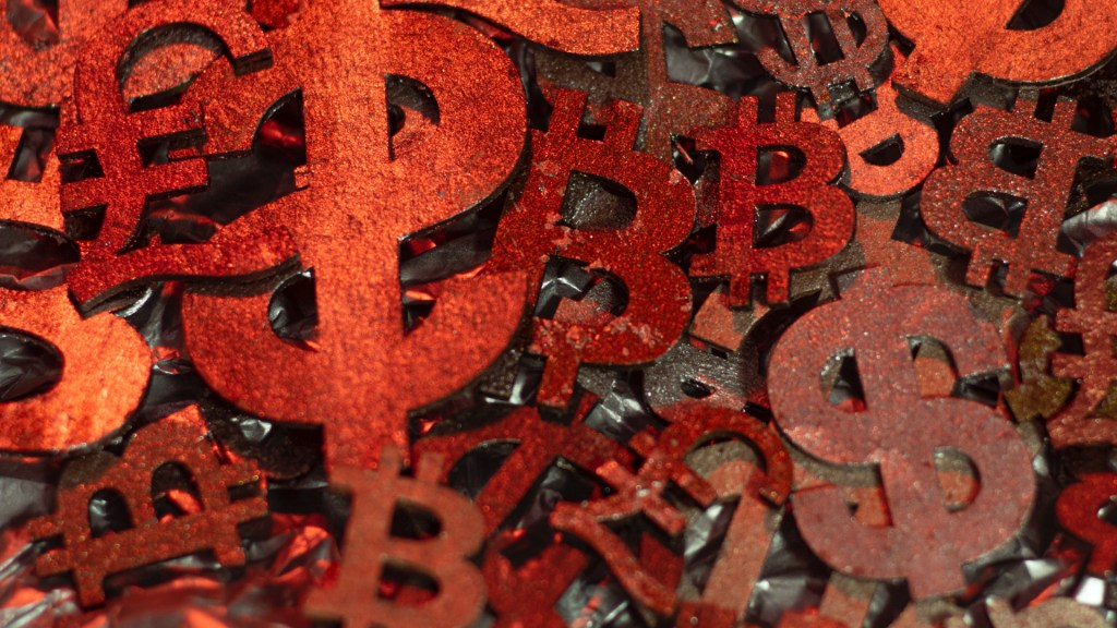 An arrangement of diverse rusty metal objects featuring various global currency symbols is displayed on the floor. Signifying the nuanced aspects of web design costs.
